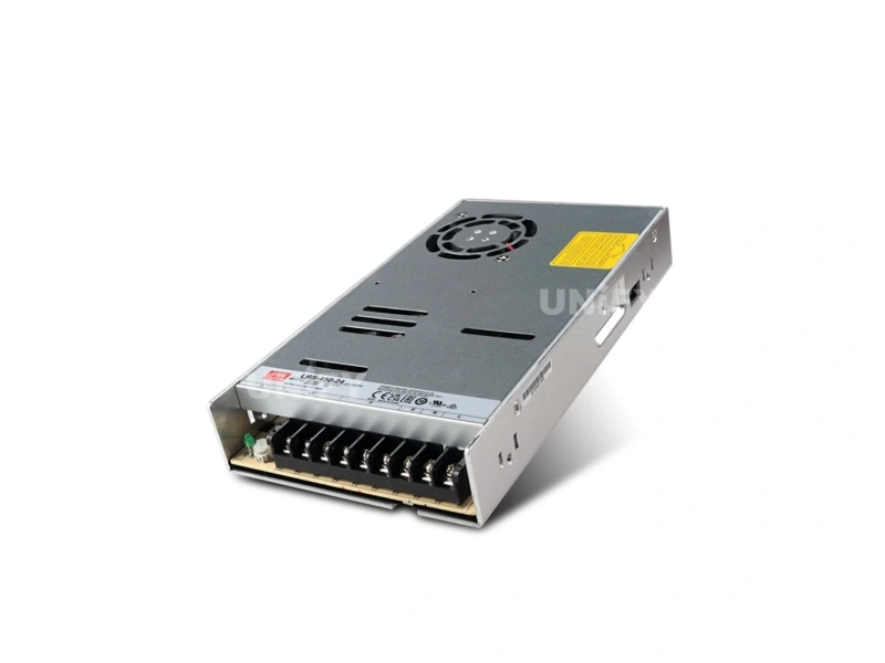 Mean Well LRS-450-24 switching power supply high angled view showing fan grille ventilation slots and terminal block